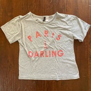 Grey shirt with pink sparkle words.